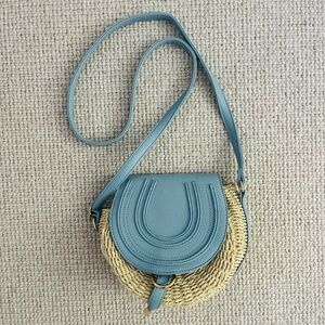 Summer straw bag with blue leather accent